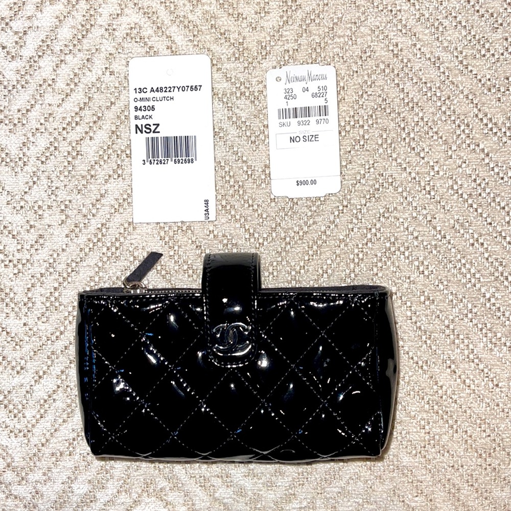 CHANEL O-Mini Clutch; Like New with original tags